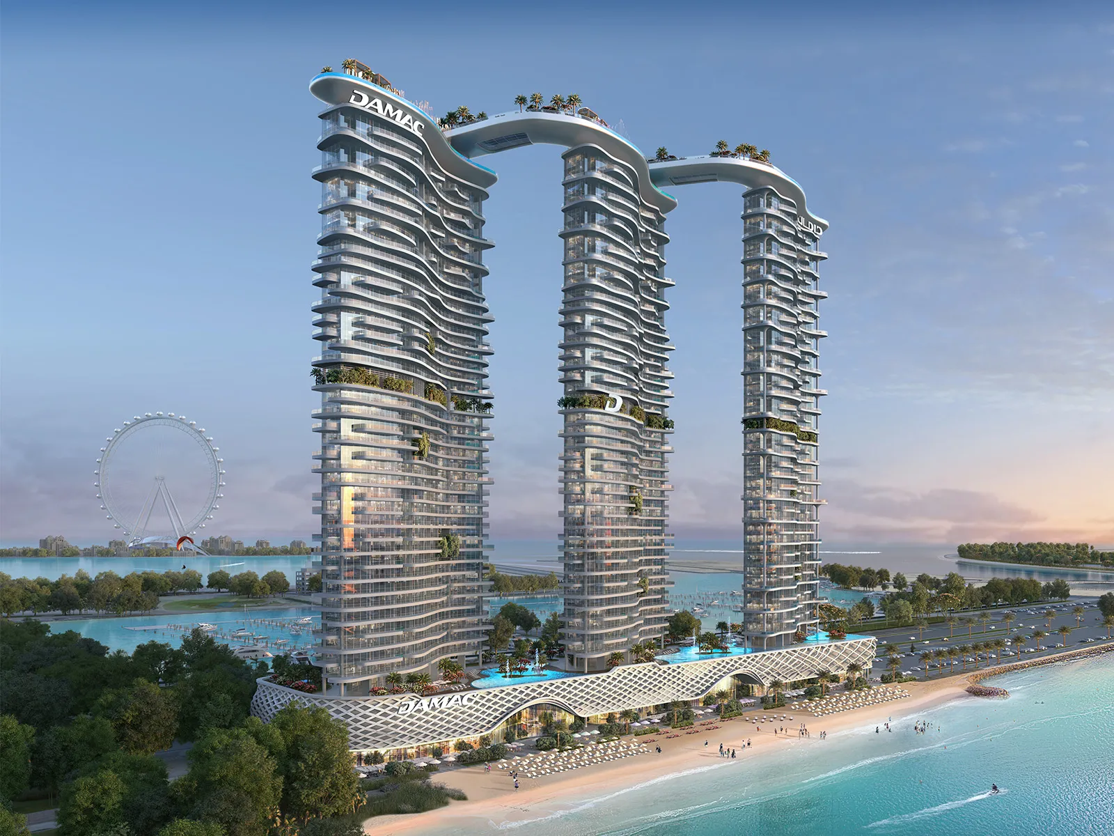 Three curved DAMAC Bay by Cavalli towers linked at the top, seen from the sea at dusk with the beach in front