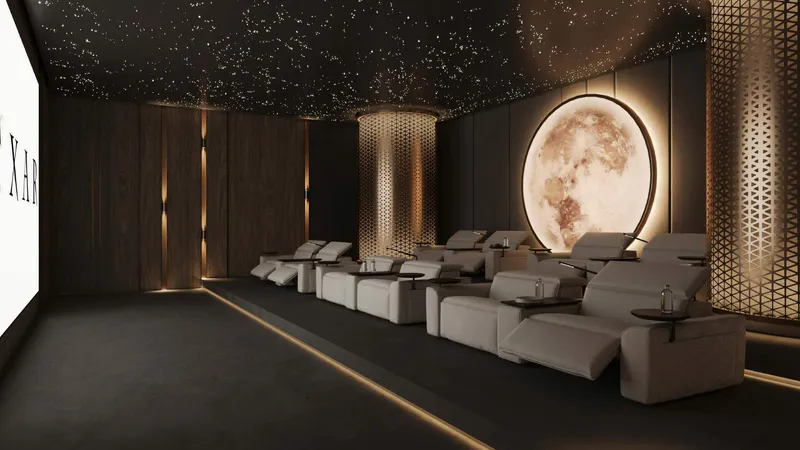 Render of the cinema room at DWTN Residences with reclining seats