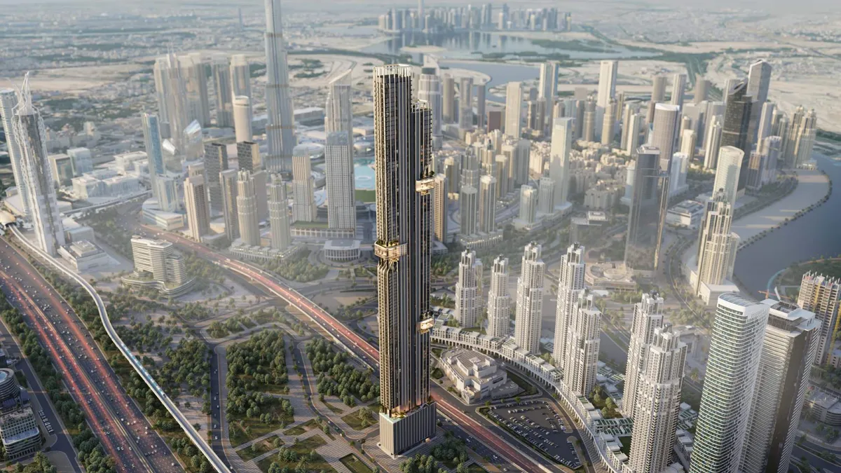 Aerial render of the DWTN Residences tower beside Sheikh Zayed Road, with Burj Khalifa and Business Bay around it