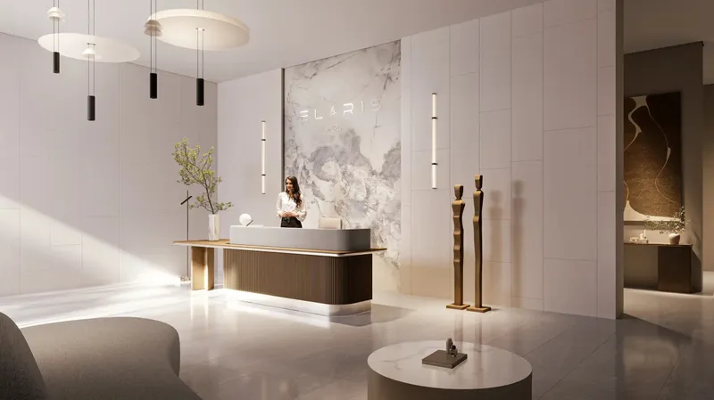 Marble-clad lobby and reception desk at ELAR1S RISE