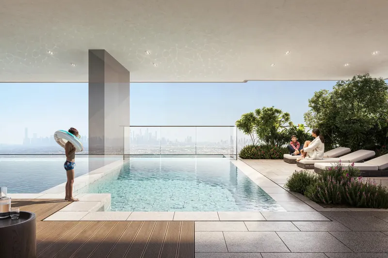 Pool deck at ELAR1S RISE with sun loungers and planting