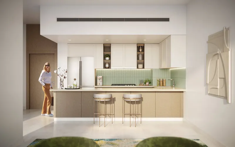Render of an open kitchen at Eleve with a breakfast counter and green tiled splashback