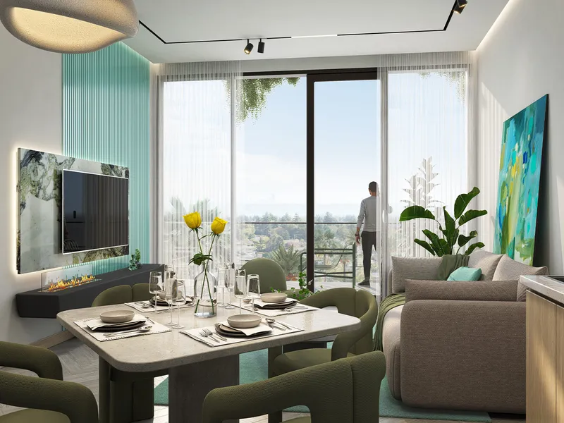 Living and dining room with full-height balcony doors in an ELO apartment