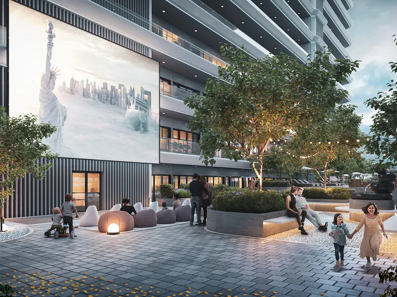 Outdoor cinema screen and seating in the landscaped courtyard at ELO