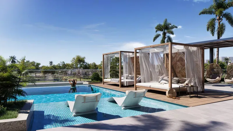Cabanas beside the pool at Enre Residence