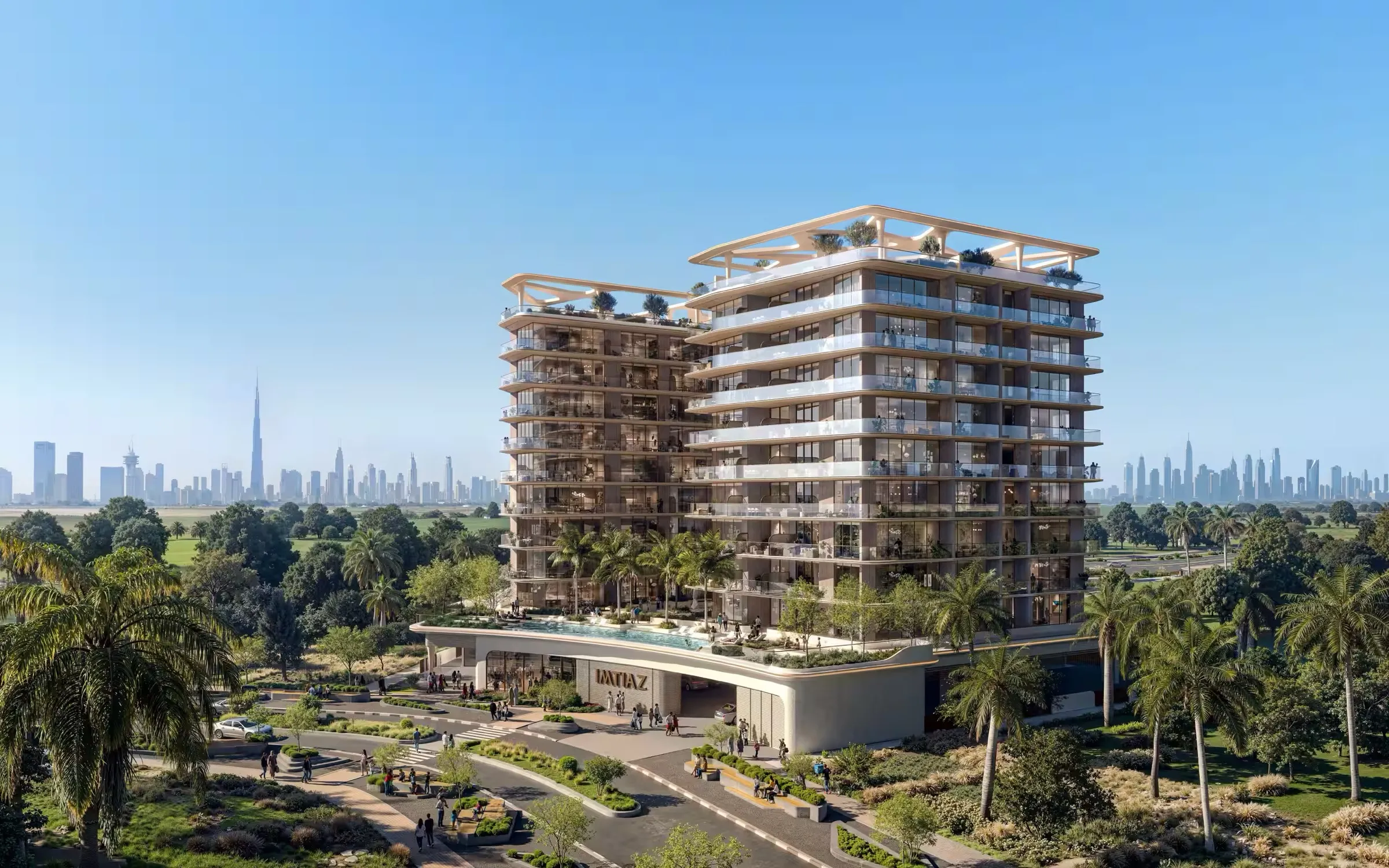 Enre Residence by Imtiaz in Dubai South, with the Dubai skyline in the distance
