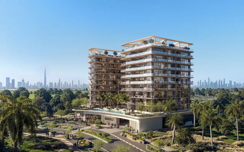 Enre Residence by Imtiaz in Dubai South, with the Dubai skyline in the distance