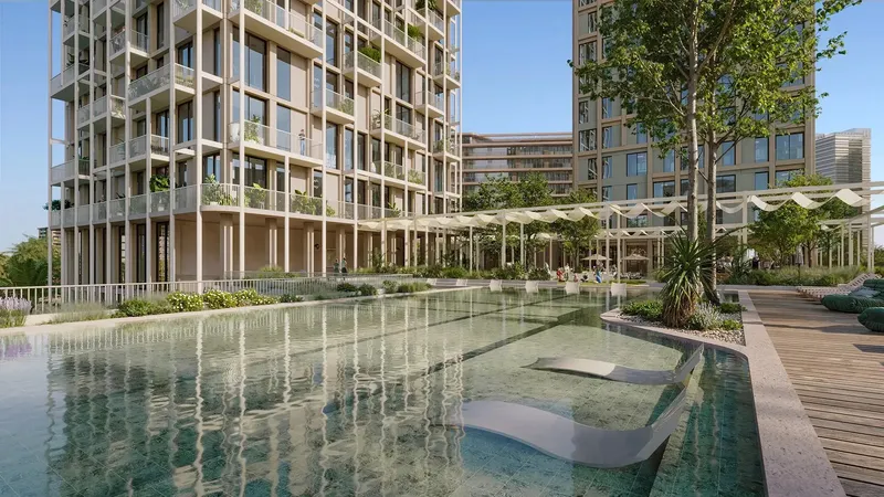 Render of the swimming pool and sun loungers at Enta Mina by RAK Properties