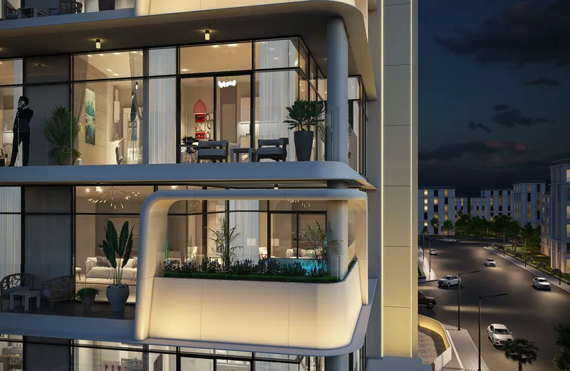 Close view of lit balconies at Estrella by Nexus at night, one with a private plunge pool