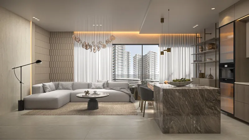 Open-plan living room and kitchen with a stone island in an Estrella by Nexus apartment