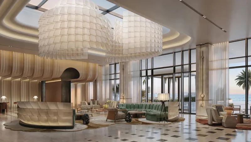 Render of the double-height reception lobby with sea views at Fairmont Residences Al Marjan Island