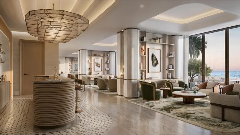 Render of the residents' owners lounge, with a bar and seating facing the sea