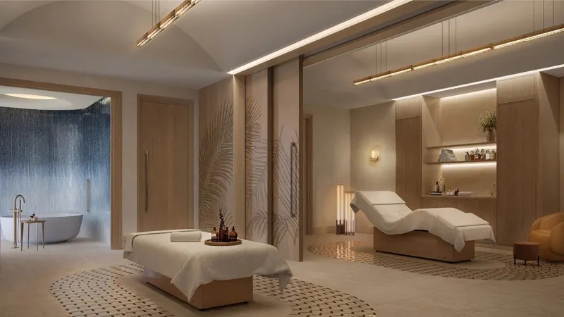 Render of a spa treatment room with a bath at Fairmont Residences Al Marjan Island