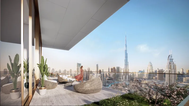 Residence terrace with seating and a view over Downtown Dubai to Burj Khalifa