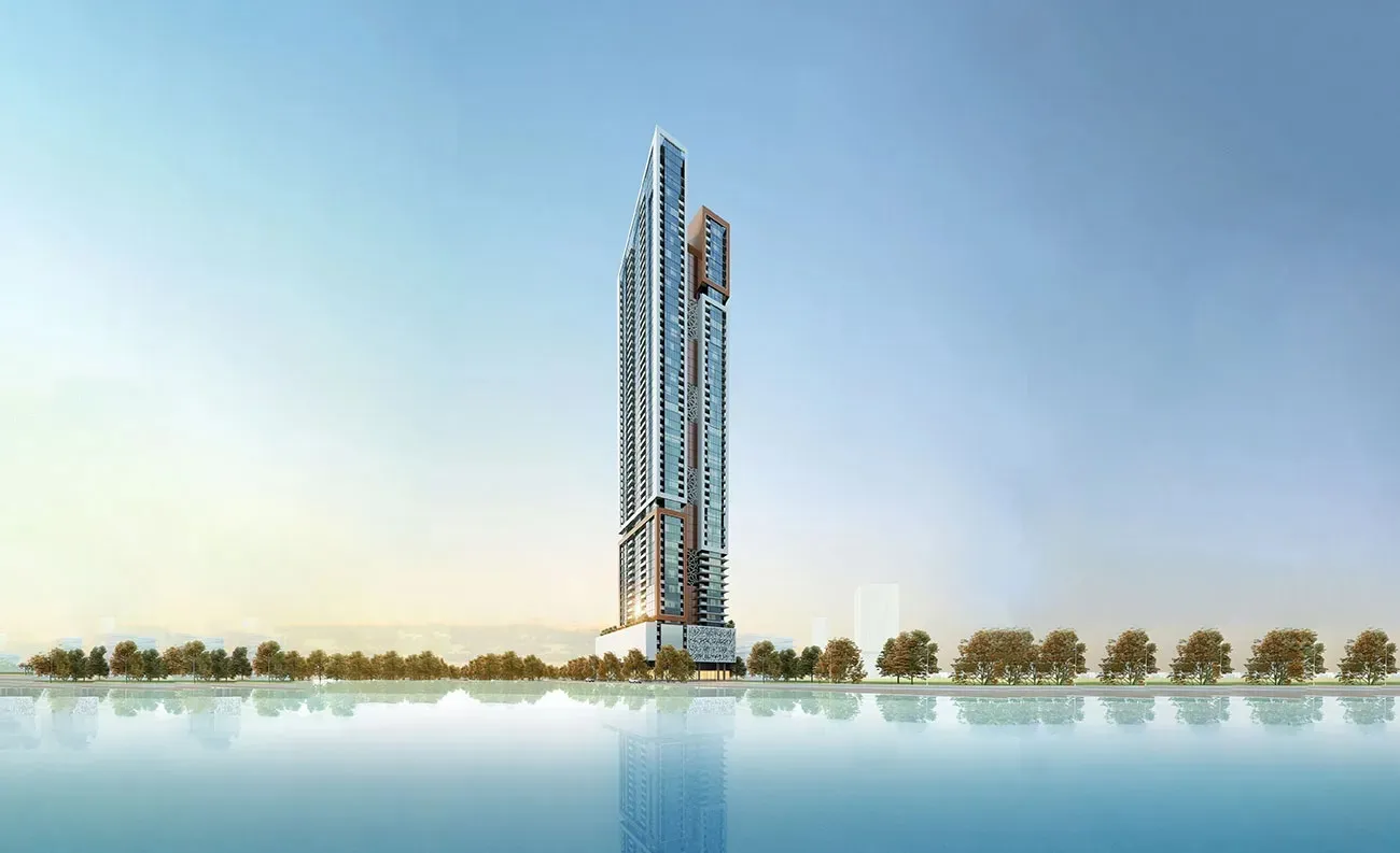 Render of Faradis Tower, a tall residential tower with copper-toned framing, seen across the water in Sharjah