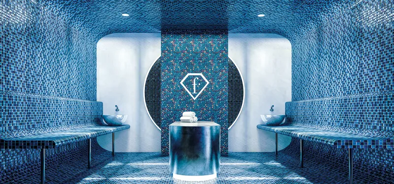 Mosaic-tiled spa room at Fashionz by Danube
