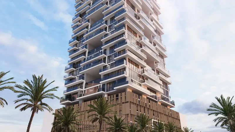 Close view of the Gharbi II Residences facade with projecting balconies and terraces