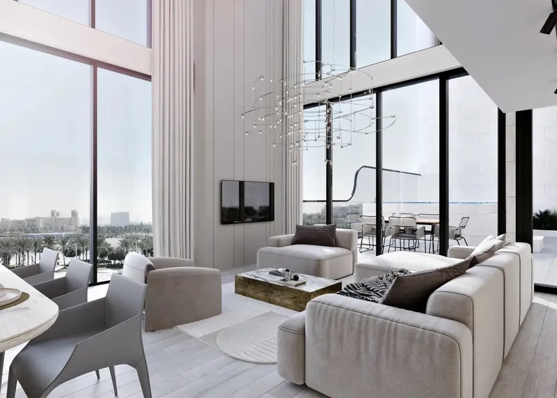 Double-height living room in a Gharbi II penthouse with full-height windows and a terrace beyond
