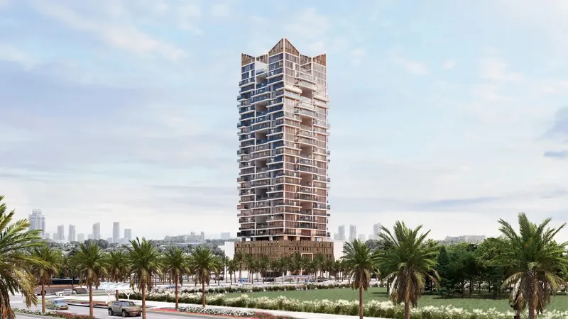 Gharbi II Residences tower with stepped balconies above a timber-screened podium, seen across a palm-lined park
