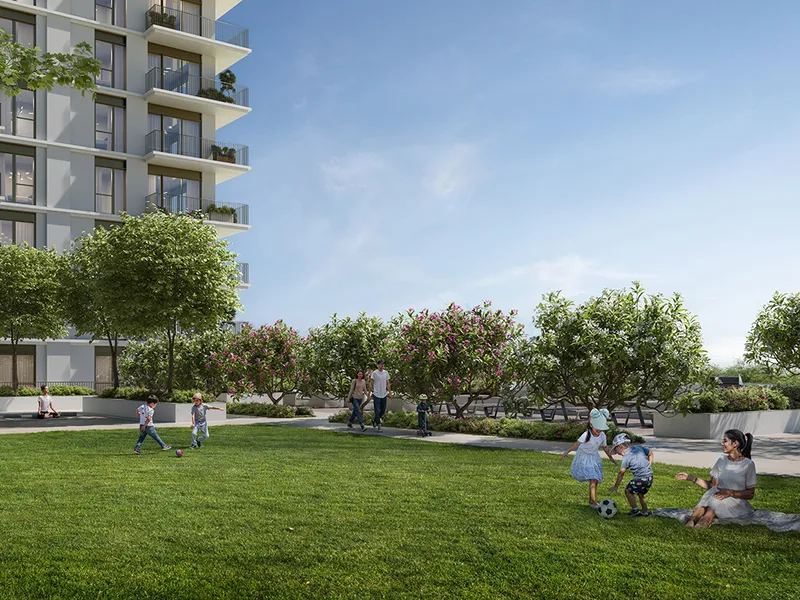 Render of families on the lawn beside a Golf Dale apartment building