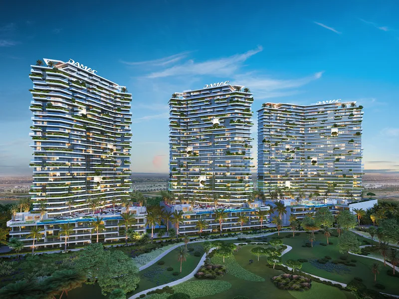 The three Golf Greens towers at dusk above their podium pools, with the golf course in front