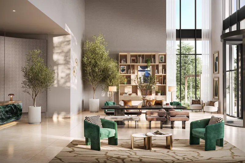 Interior render of the double-height Golf Hillside lobby with seating and bookshelves