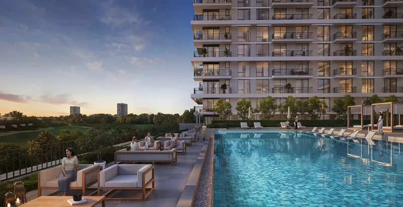 Render of the Golf Meadow pool deck at dusk with an apartment building behind