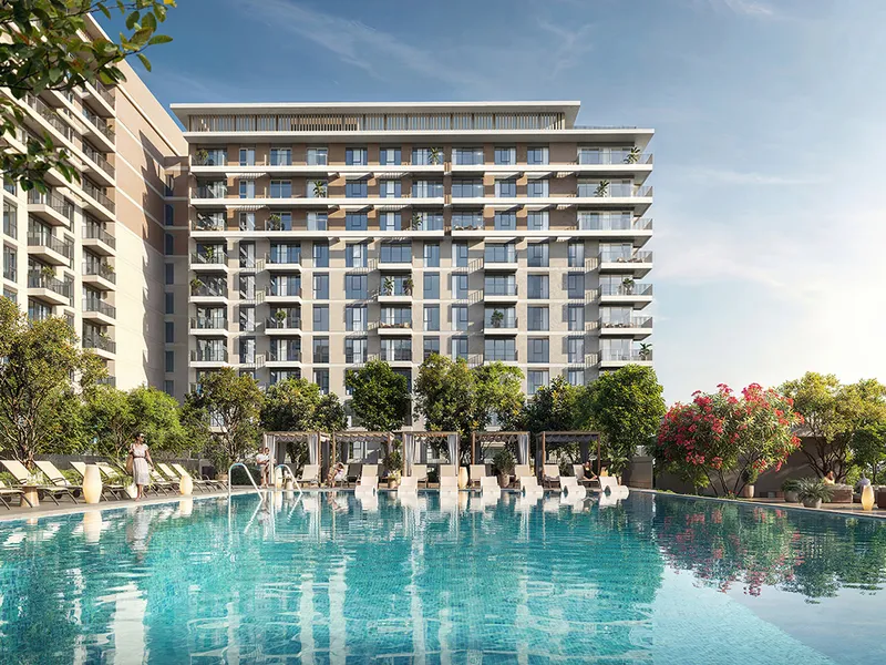 Render of a Golf Point mid-rise apartment building seen across the podium swimming pool