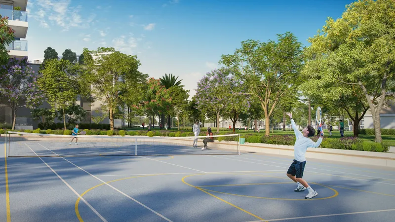 Render of residents playing on the Greenside Residence outdoor sports court