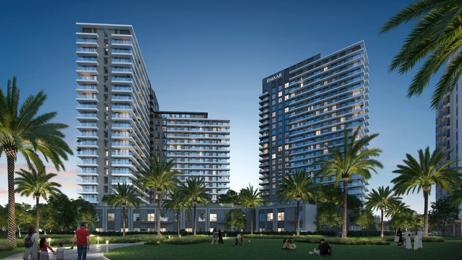 Render of the Greenside Residence towers at dusk above a landscaped lawn