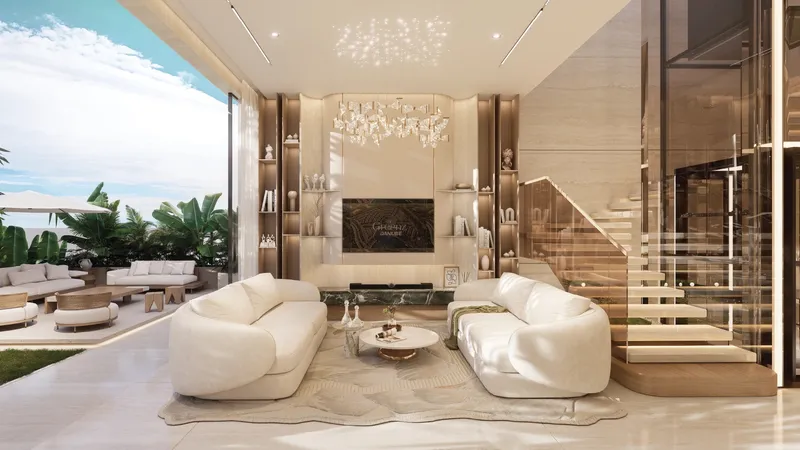 Furnished double-height living room with floating staircase in a Greenz by Danube villa