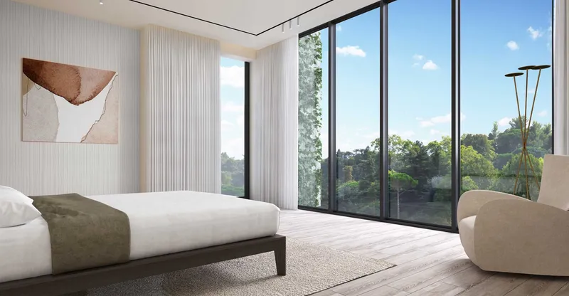Render of a Hayyan villa bedroom with corner windows looking on to trees