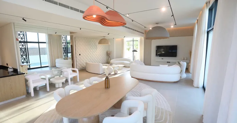 Open living and dining room in the Hayyan show villa