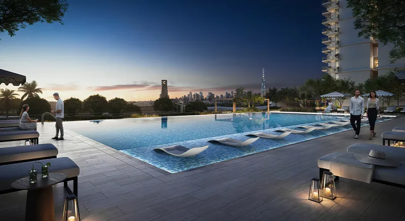 Render of the Hillsedge swimming pool and deck at dusk with the Dubai skyline in the distance