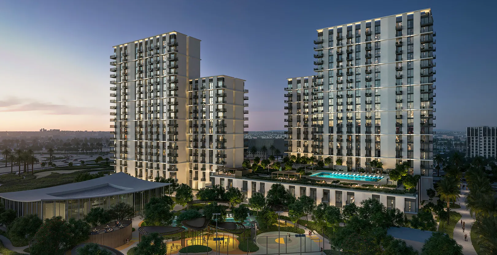 Aerial render of the Hillsedge towers at dusk with the podium pool and sports courts of Hillside Park