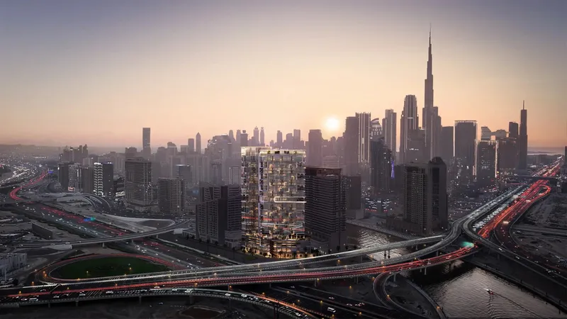 Aerial render of HQ by Rove at sunset beside the Dubai Canal, with the Burj Khalifa and Downtown Dubai behind