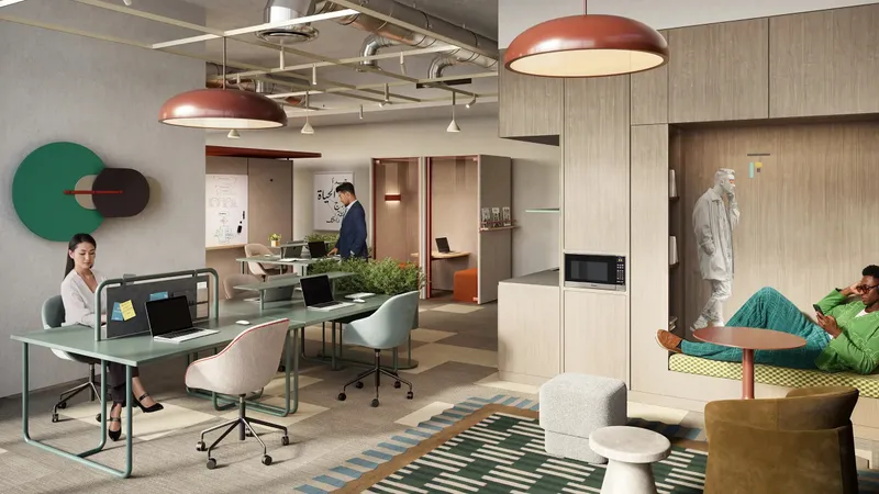 Furnished modular office with desks, pendant lights and a lounge corner