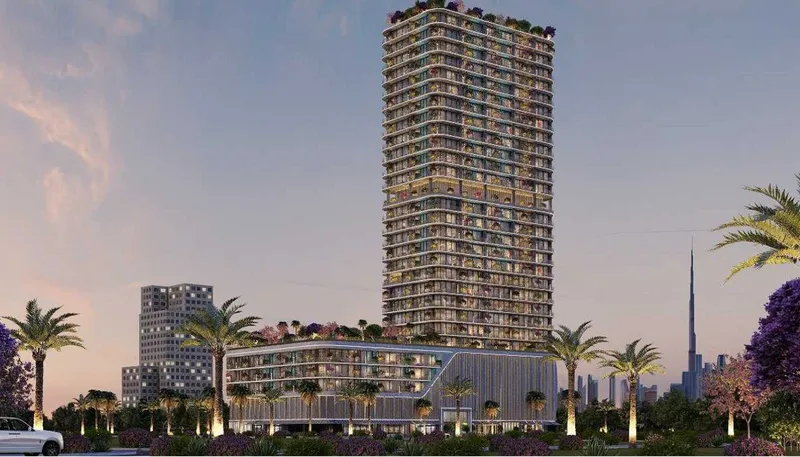 Interstellar Tower rising above its podium among palm trees, with the Burj Khalifa on the skyline