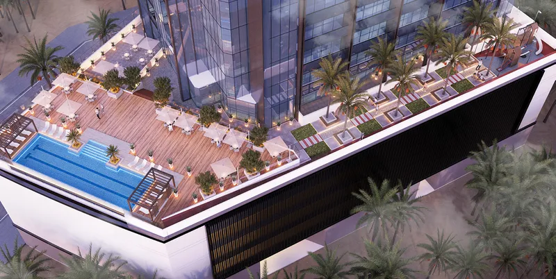 Aerial render of the Jade Tower podium deck with a swimming pool, sun loungers and shaded seating