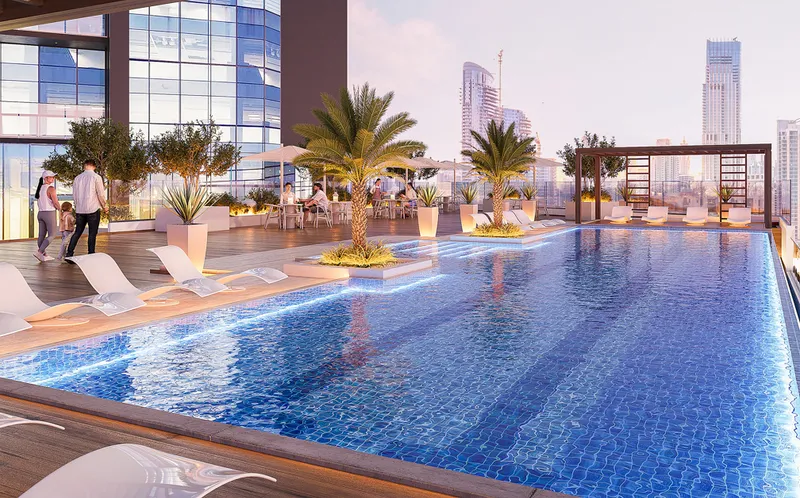 Render of the outdoor swimming pool at Jade Tower with palms and loungers beside the glass facade