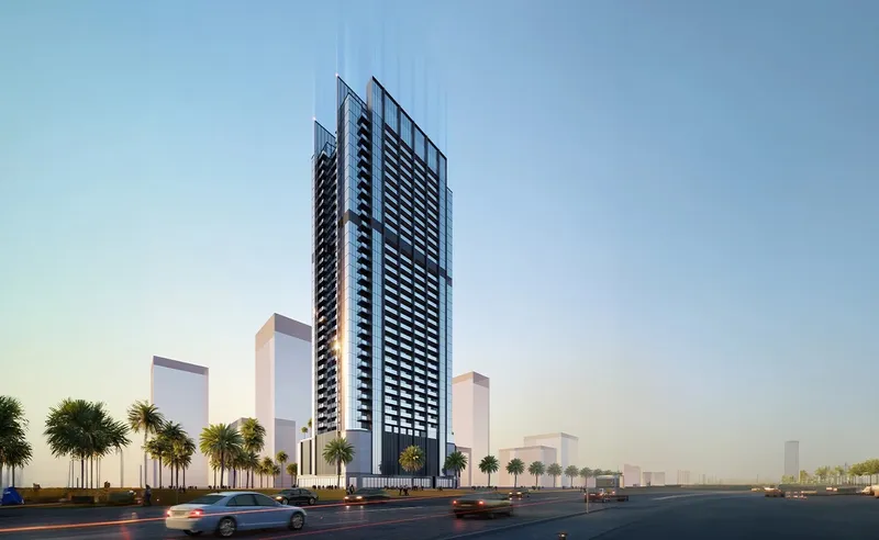 Render of Jade Tower, a dark glass residential high-rise in Majan, seen from the road at dusk