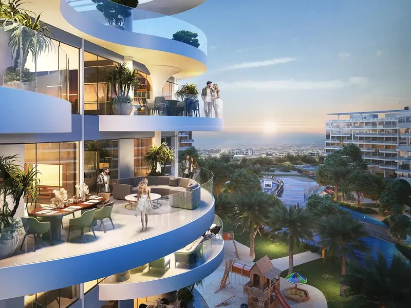 Curved balconies at Lagoon Views overlooking the lagoon and gardens at sunset