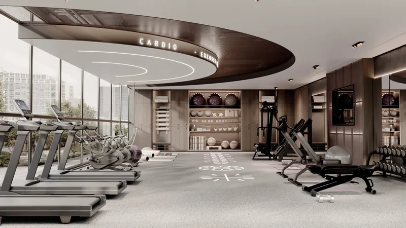 Gym with cardio machines and glazed walls at Le Blanc