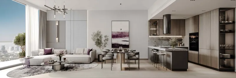 Open-plan living area and kitchen in an apartment at Le Blanc