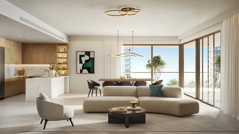 Render of an open-plan living room and kitchen in a Lunara apartment