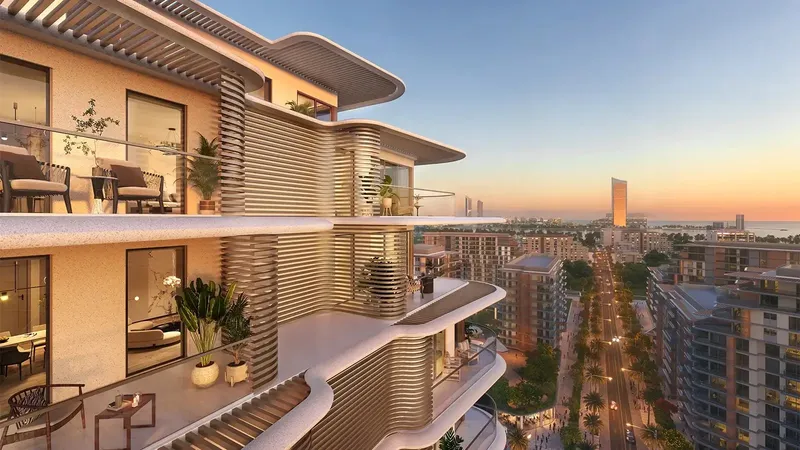 Render of a terrace at Lunara on The Strand at sunset, looking down the street towards the sea