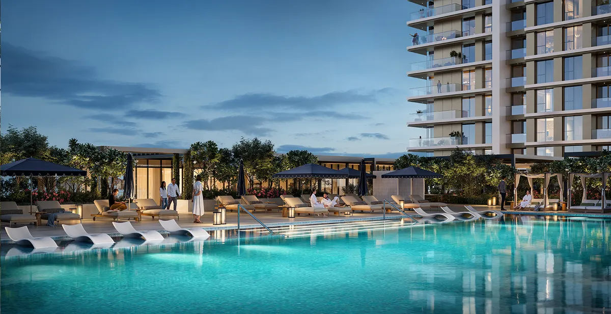 Render of the Lyvia by Palace infinity pool and pool deck at dusk