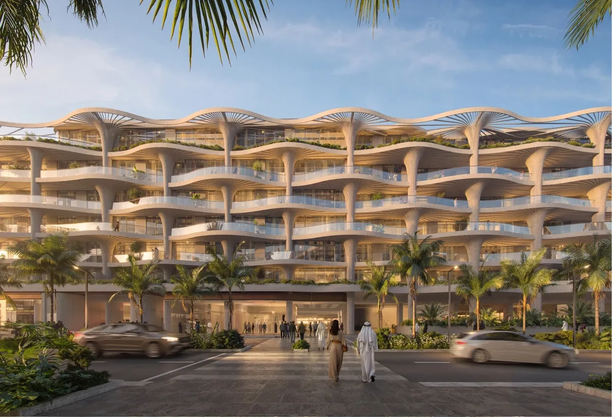 Render of the Mamsha Palm building on Saadiyat Island with curved, layered balconies and palm-lined arrival court