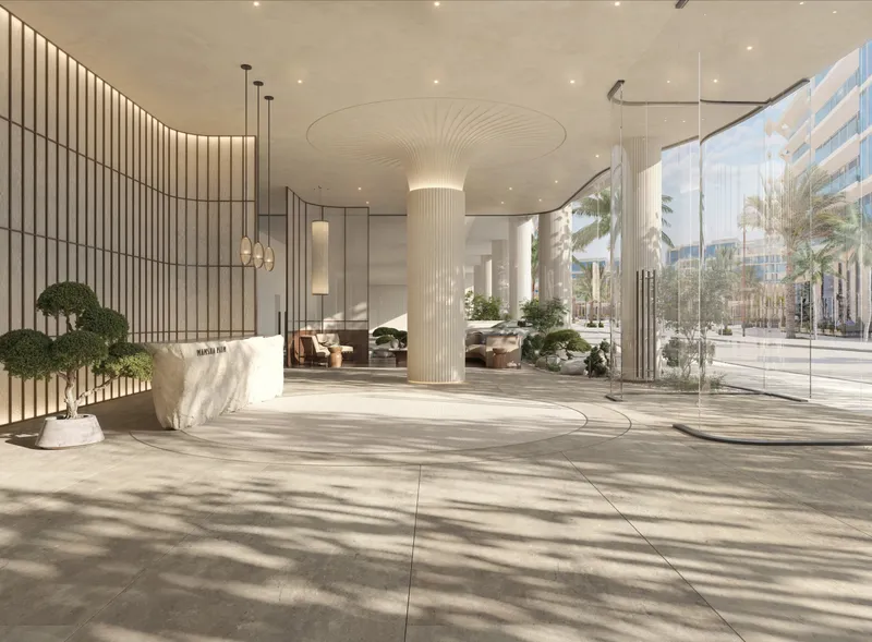 Render of the Mamsha Palm arrival lobby with slatted timber walls, a round column and lounge seating