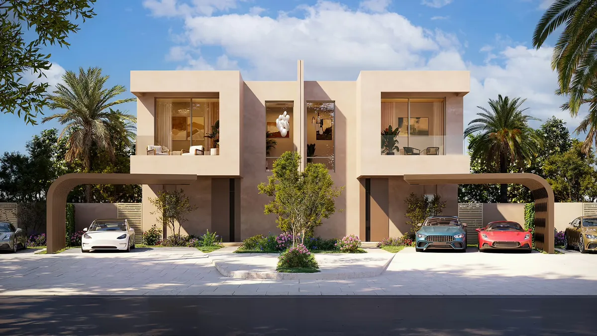 Street view of a pair of two-storey duplex homes with arched car porches and palm trees